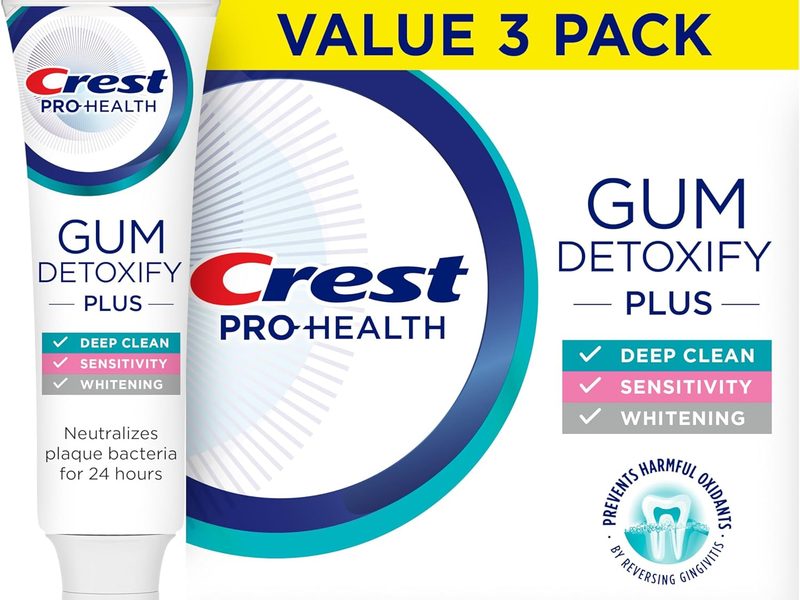 Crest Pro-Health Gum Detoxify Plus Toothpaste, three 4.5 oz tubes of fluoride toothpaste for gum care, sensitivity protection, whitening, anticavity protection, and plaque control.